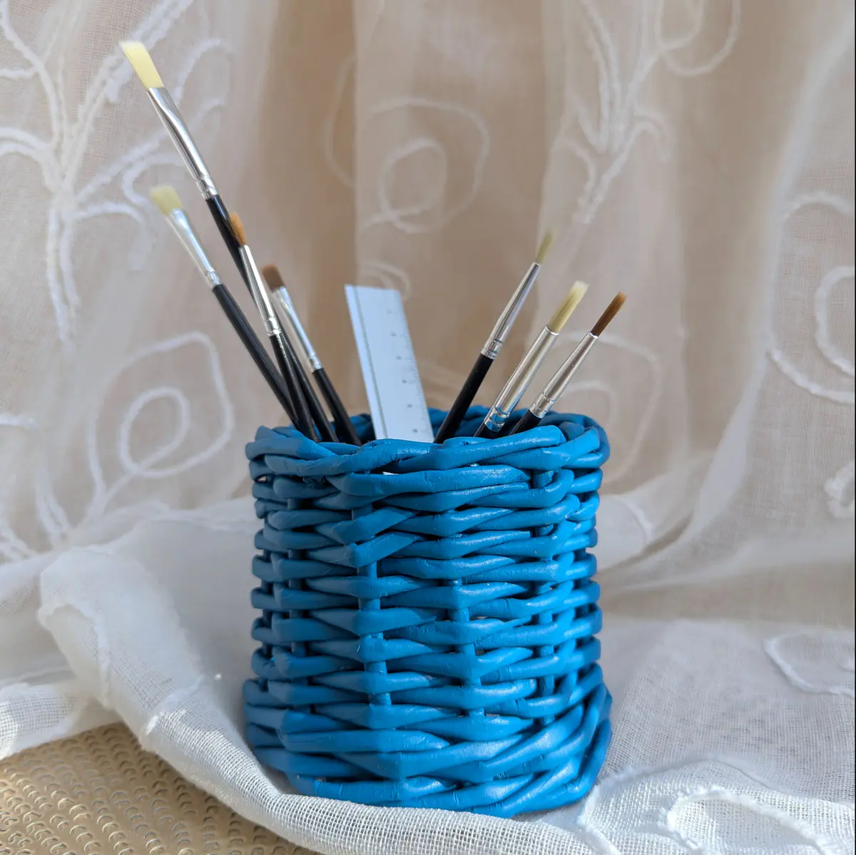 Small woven handmade recycled paper storage basket 