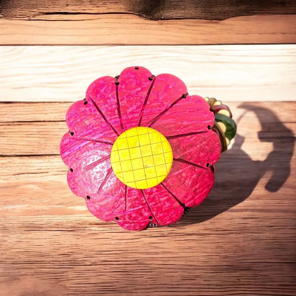 A red handmade wooden coin purse for kids