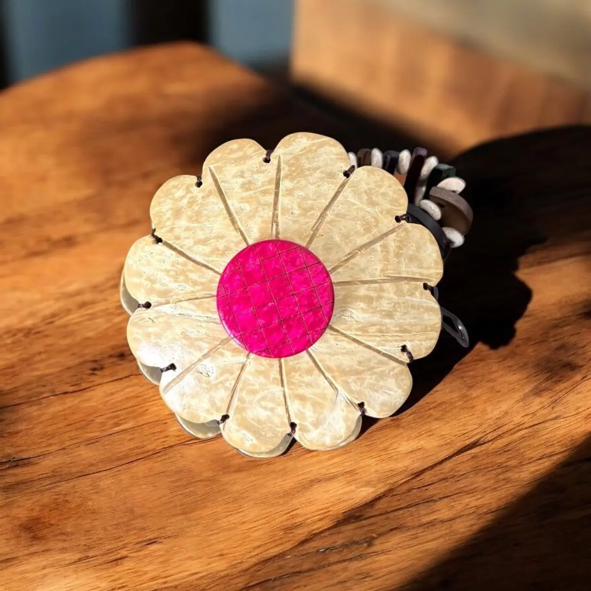 A white handmade wooden coin purse for kids