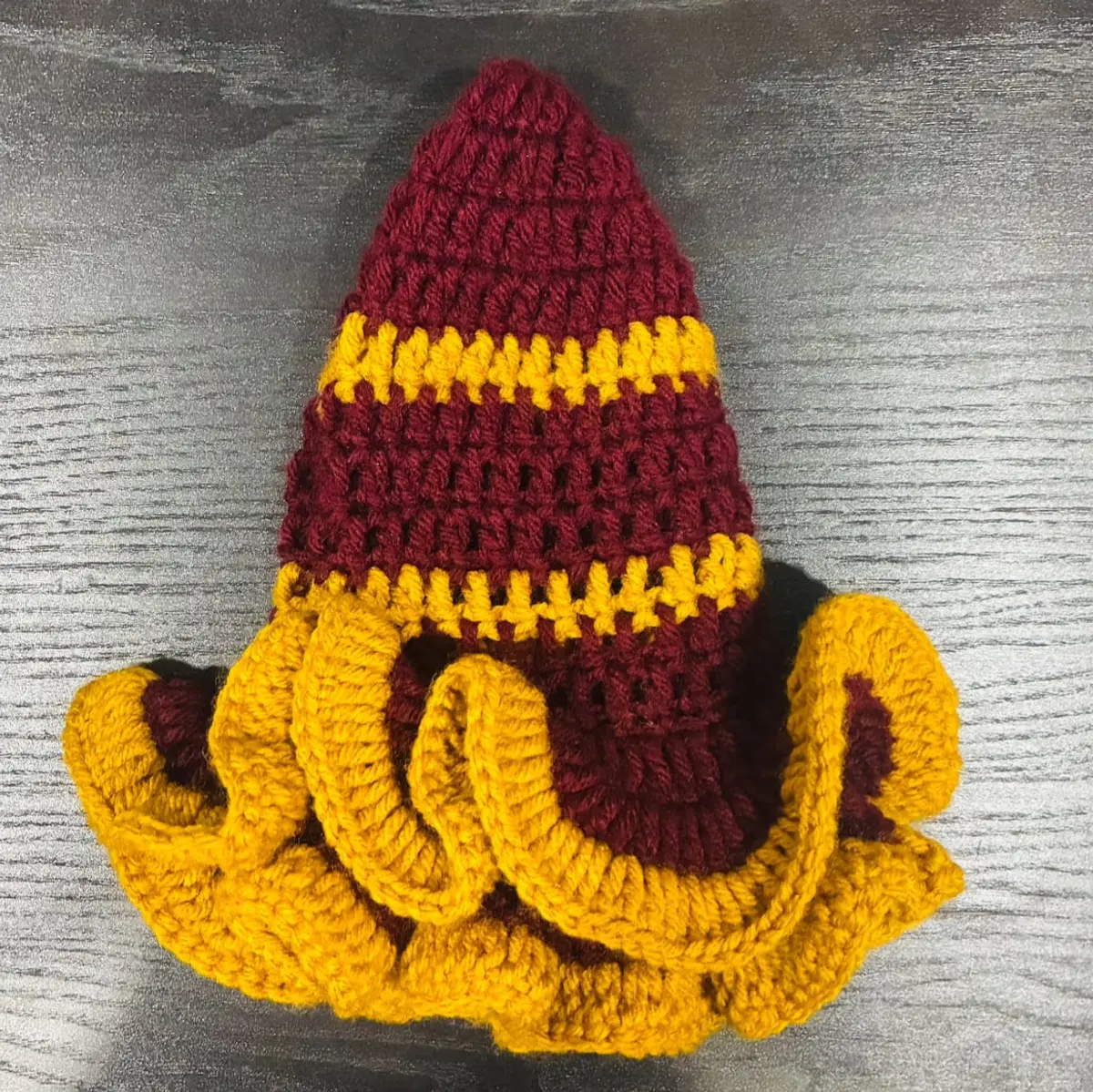 A handmade burgundy mustard yellow crochet hat for women
