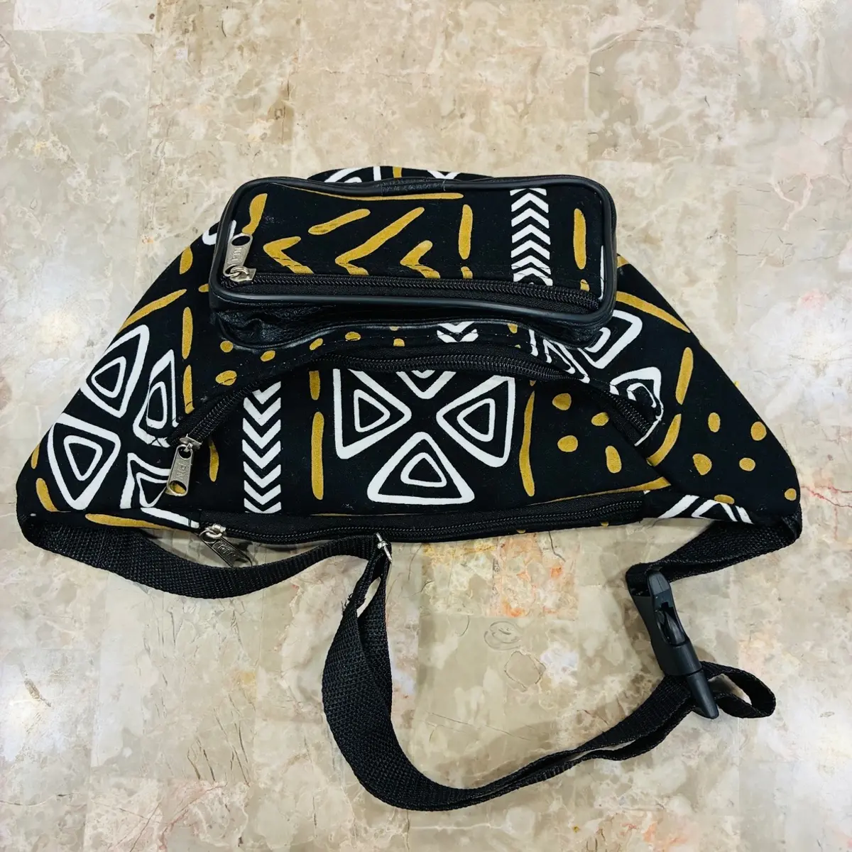 A handmade african print fanny pack