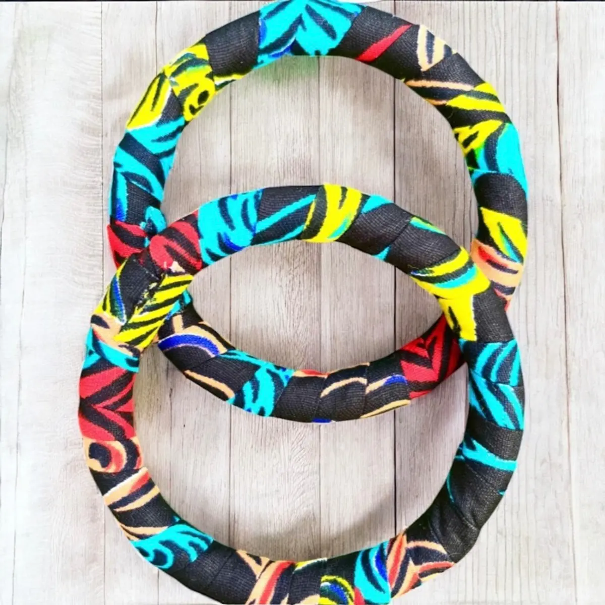 A handmade multi-pattern Ankara bangle bracelet