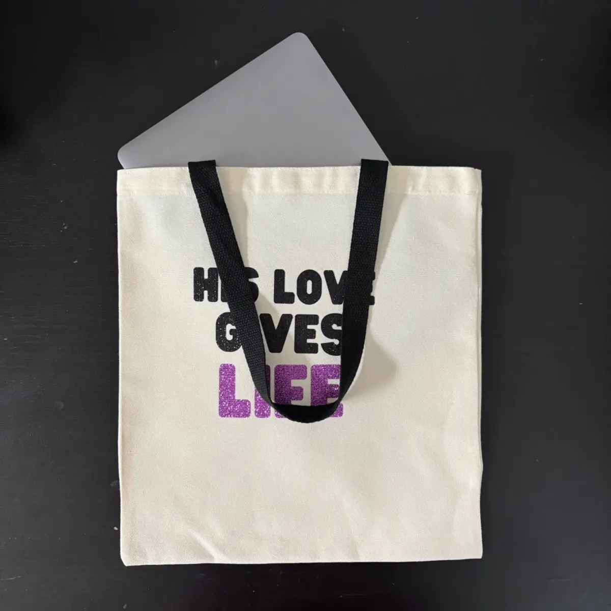 Showcasing items fitting in the tote bag