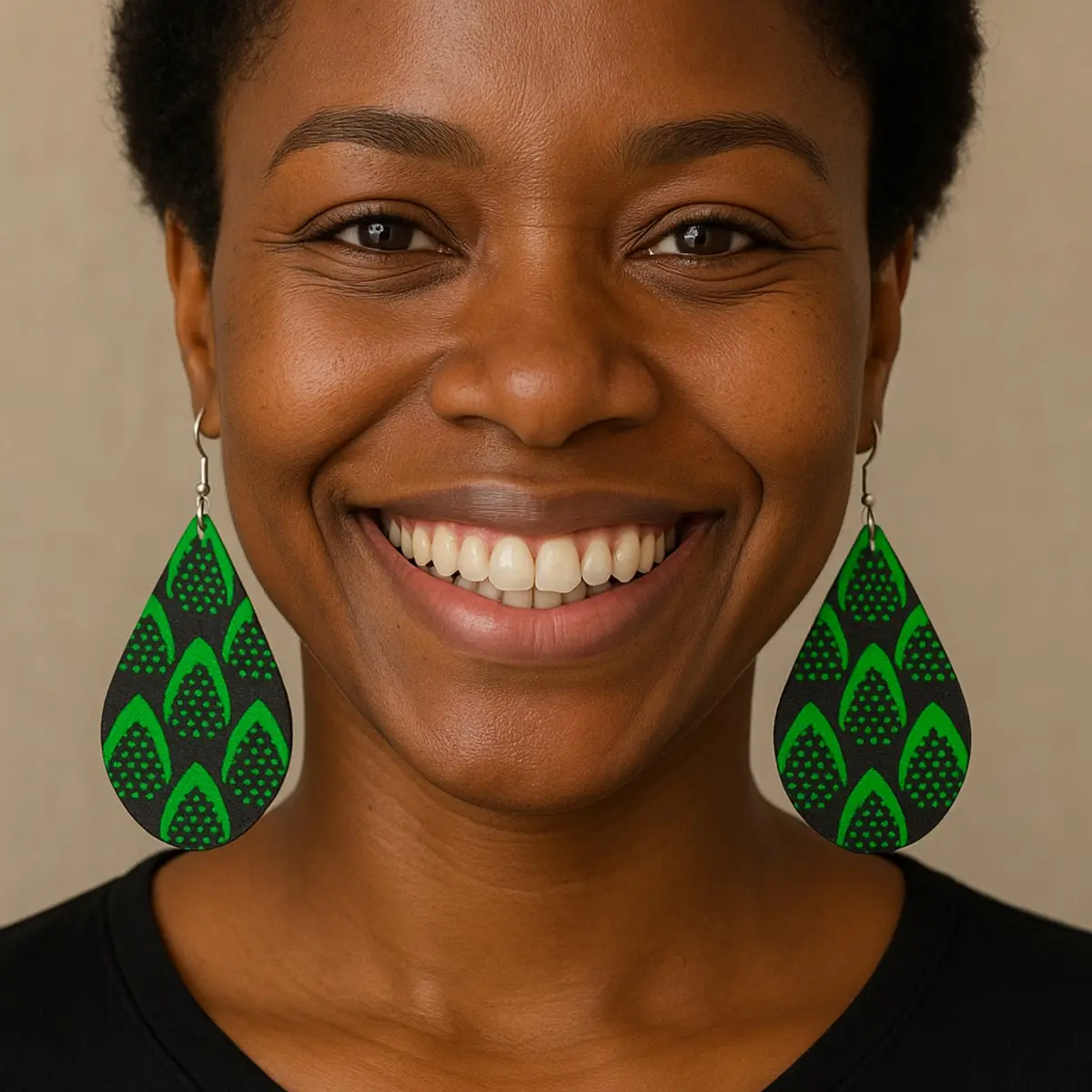 Female Model wearing teardrop earrings made from Ankara Fabric