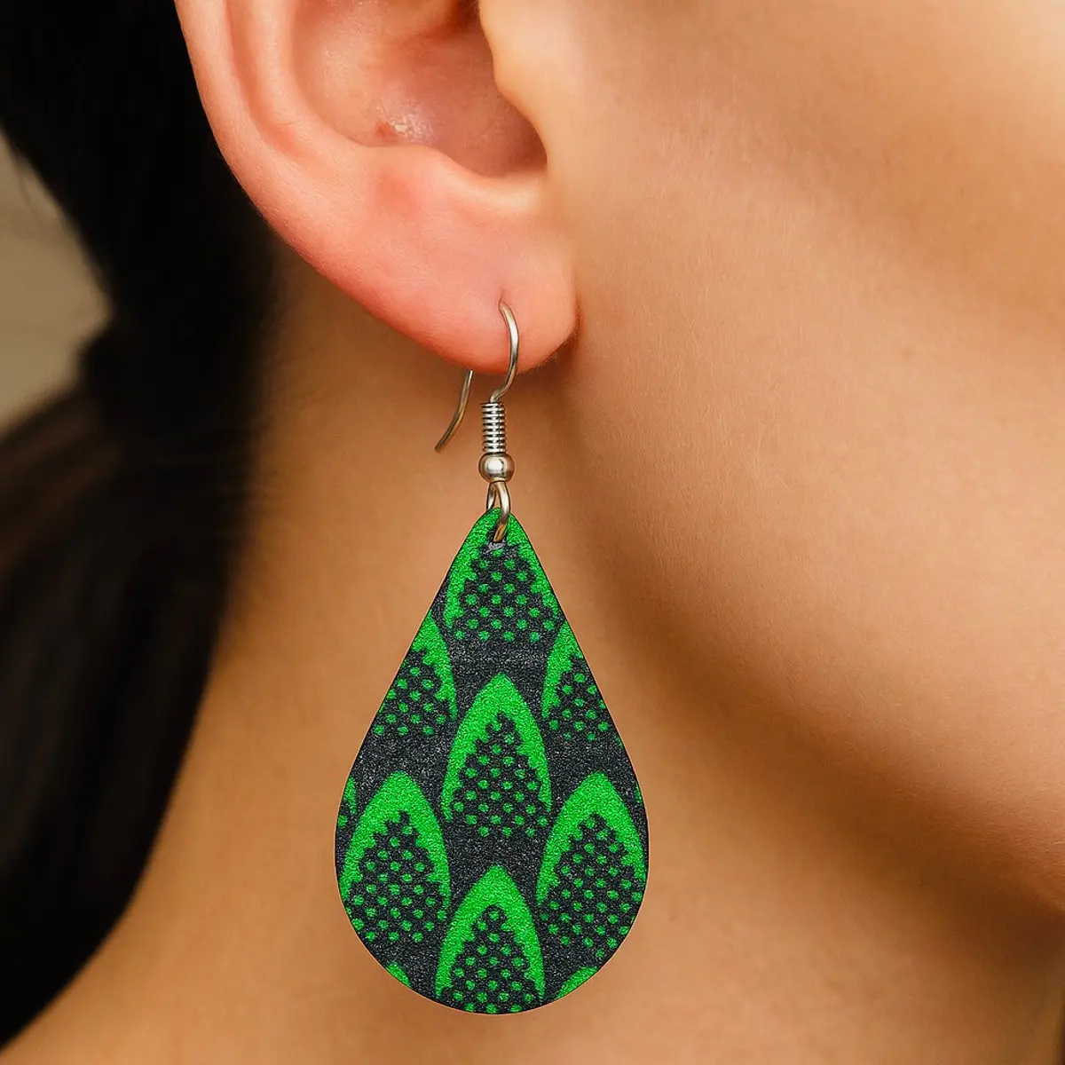 An image of close-up of the teardrop earrings