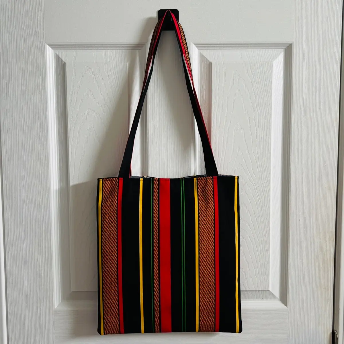 The back of a handmade Ankara tote bag for women