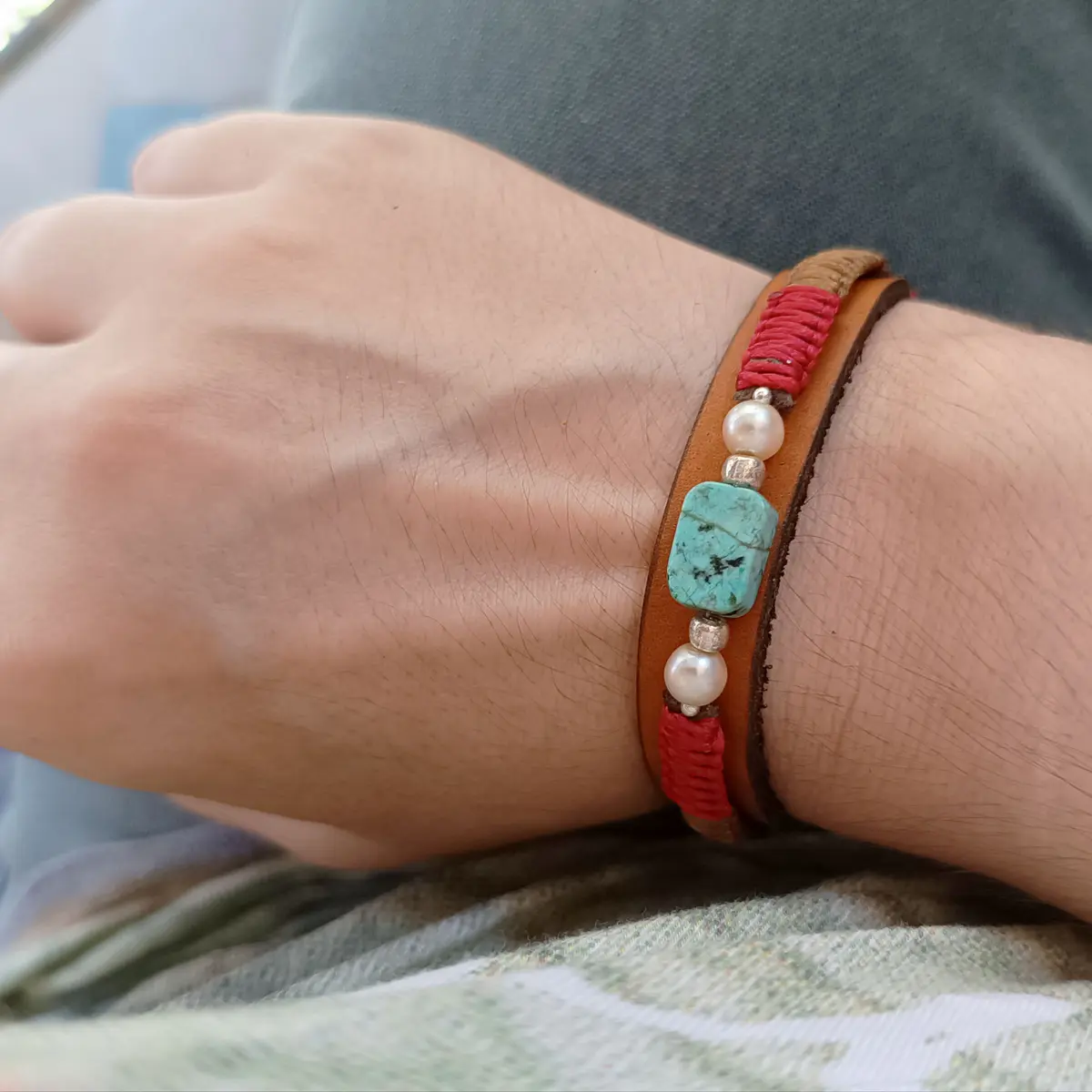 Ancestral Earth Leather Bracelet with African Turquoise worn on wrist