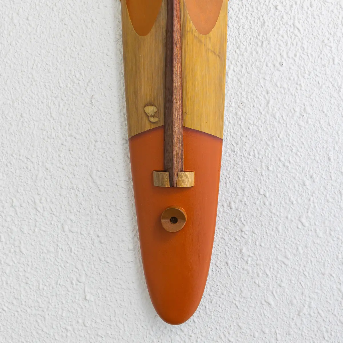 Lower half of a handcrafted and hand painted bamboo art