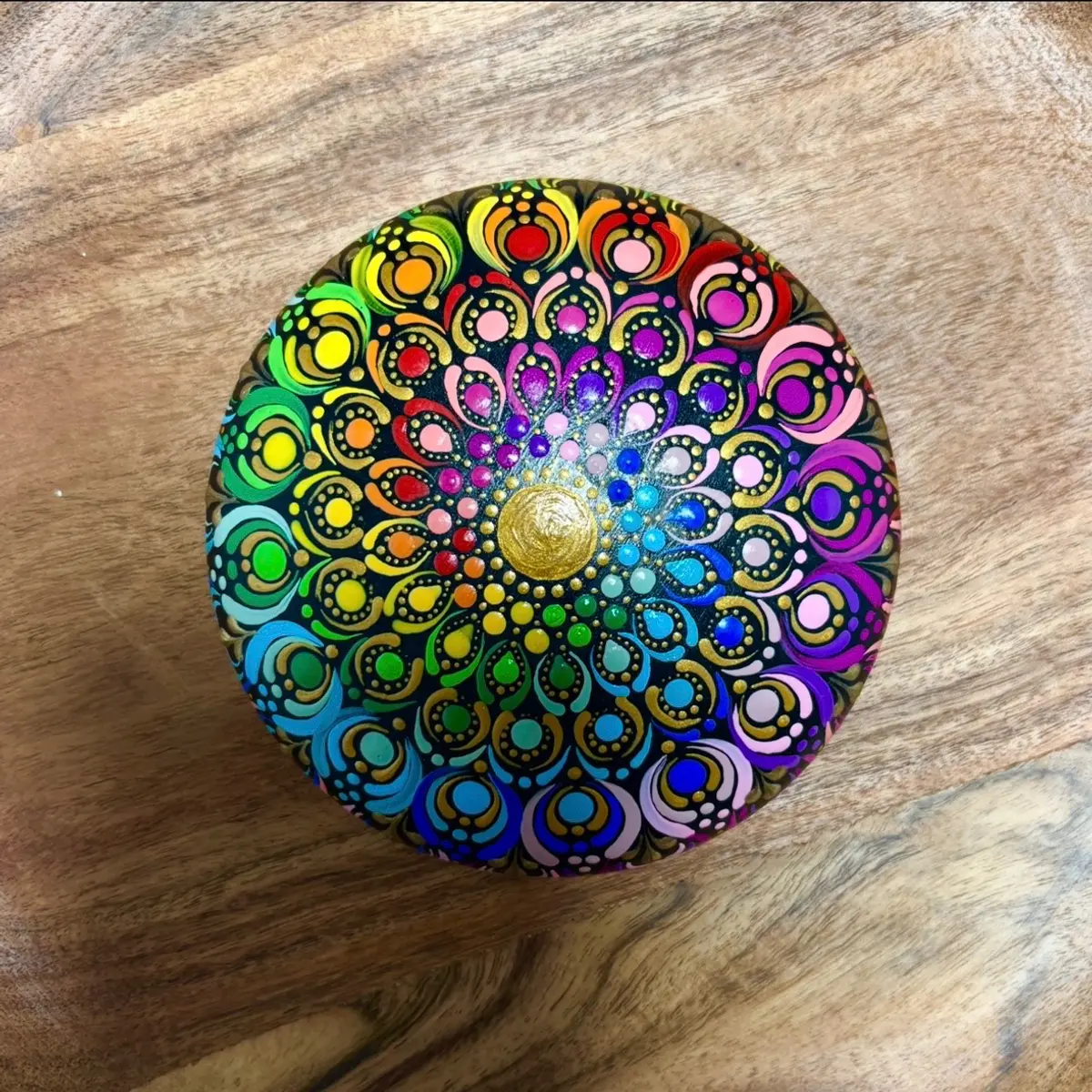 A rainbow mandala rock