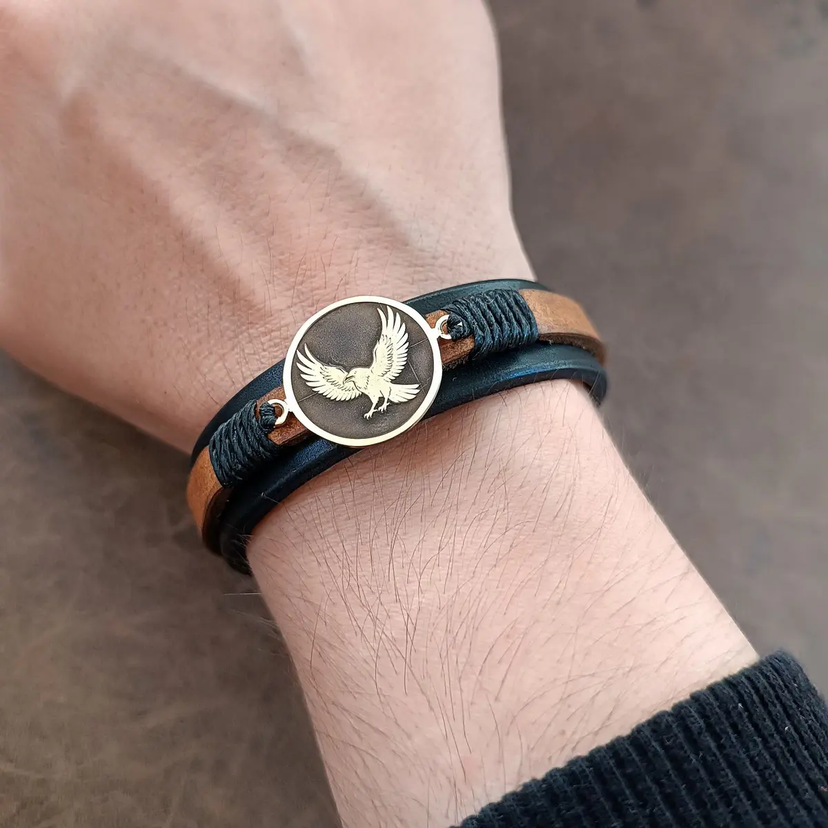 Crow Leather Bracelet worn on wrist