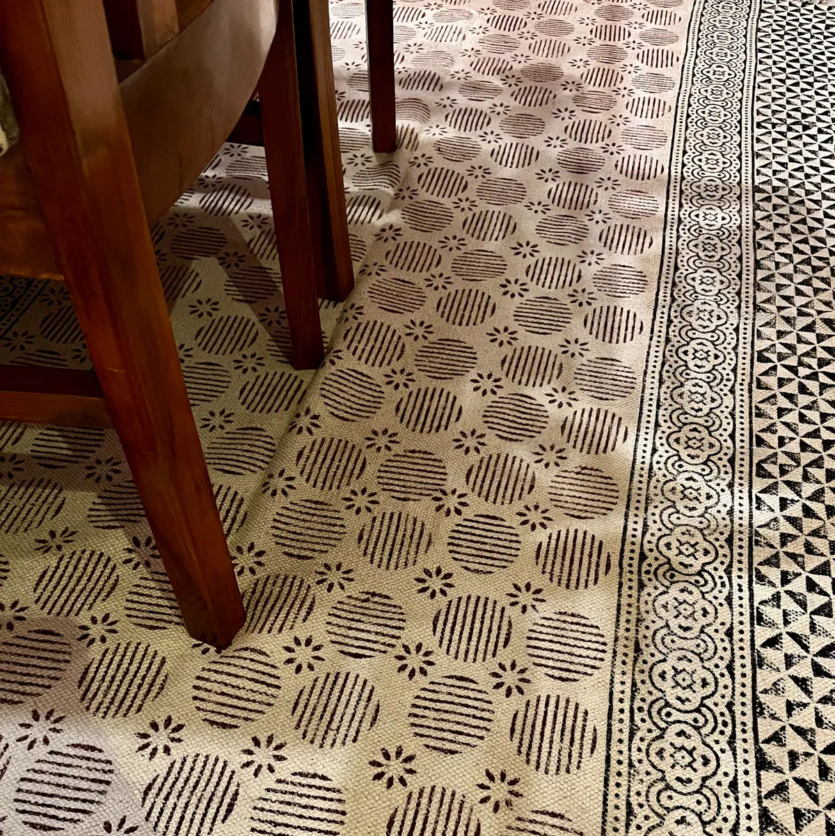 Block printed handmade Indian cotton rug for all block printing lovers. The area rugs are printed using eco-friendly dyes in traditional designs from India. Our handmade block print cotton rugs are skin friendly and manufactured using long lasting cotton fabric. With a neutral color and fashion forward patterns, these are pieces you can build a room around. This boho inspired cotton rug has a smooth finish, created by stamping wooden blocks onto the surface. Available from us at a remarkably affordable price, you can use it to decorate your Living Room, Bedroom, Office, Kitchen, Kids Area, Hallway, Entryway, Bathroom, and many more spaces.