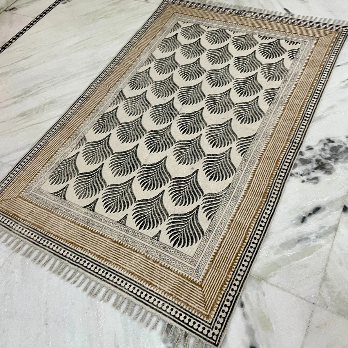 Buy premium handmade cotton rugs from India. Ethically crafted, stylish & perfect for living room and bedroom décor.