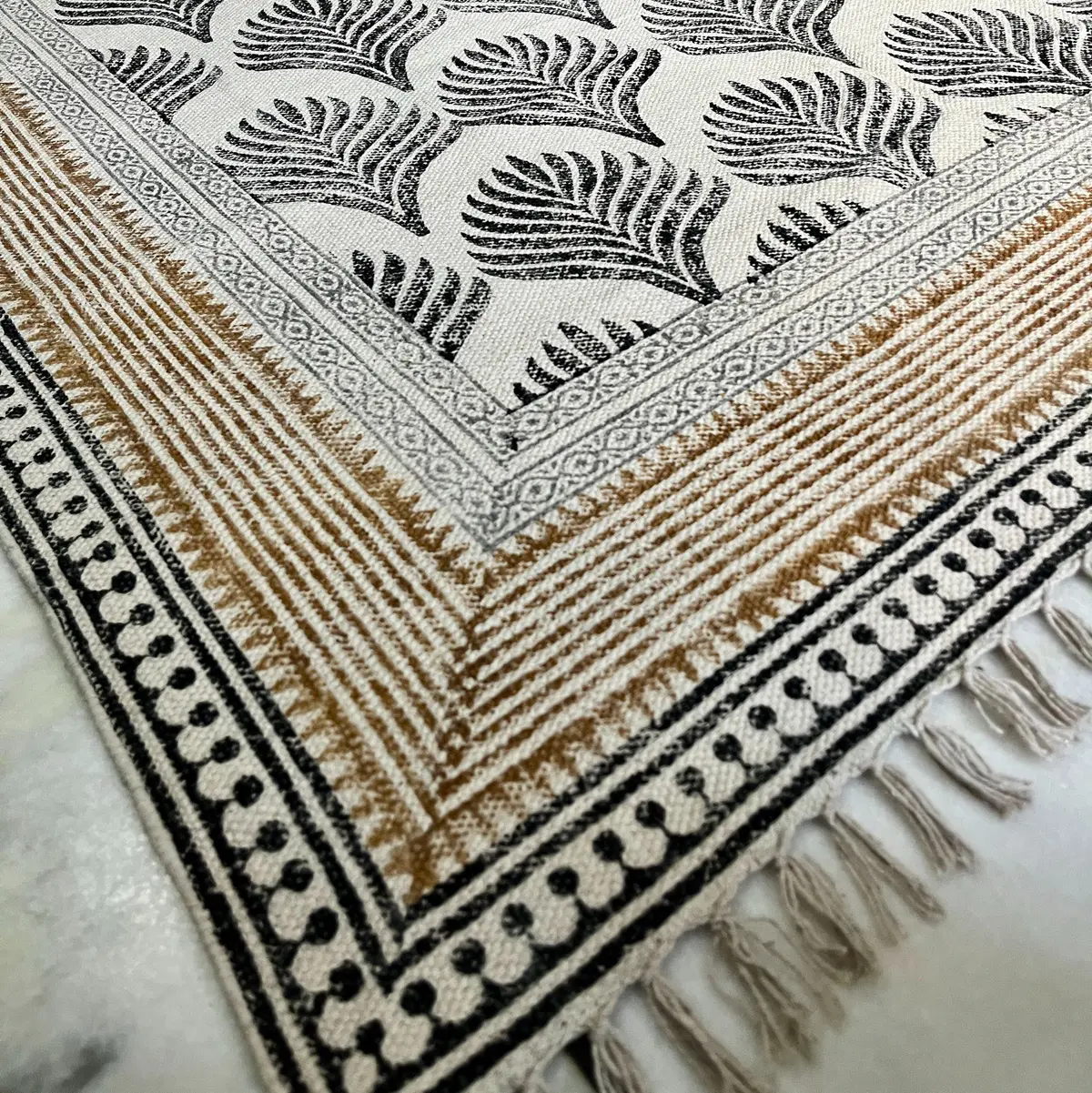 Buy premium handmade cotton rugs from India. Ethically crafted, stylish & perfect for living room and bedroom décor.