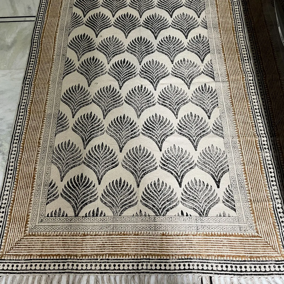Buy premium handmade cotton rugs from India. Ethically crafted, stylish & perfect for living room and bedroom décor.