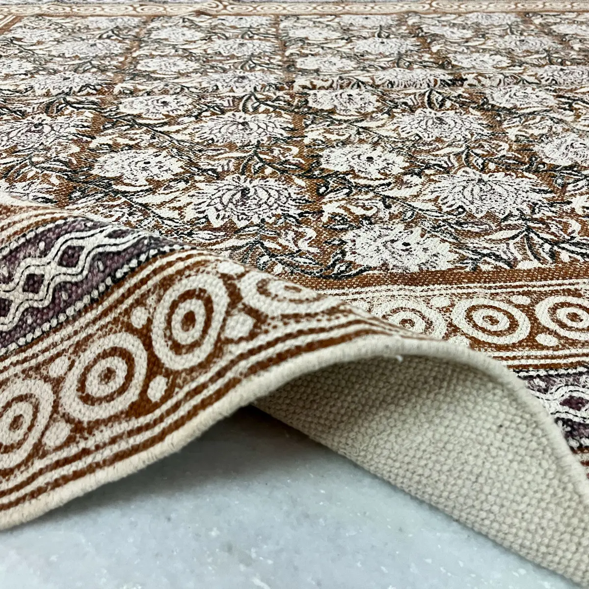 Explore boho handmade Indian rugs in natural cotton. Durable, stylish area rugs for modern and traditional homes.