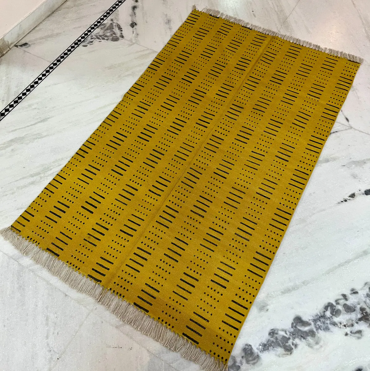 Handcrafted Indian cotton rugs with timeless design. Shop boho area rugs for living room, bedroom & home décor.