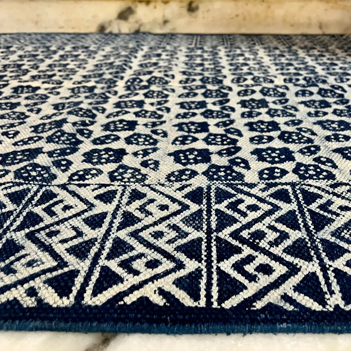 Shop handmade Indian cotton rugs crafted by skilled artisans. Boho, modern & durable area rugs for living rooms and bedrooms.