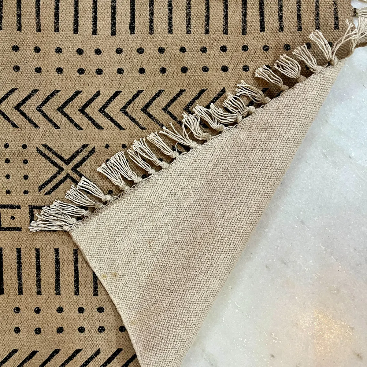 Explore boho handmade Indian rugs in natural cotton. Durable, stylish area rugs for modern and traditional homes.