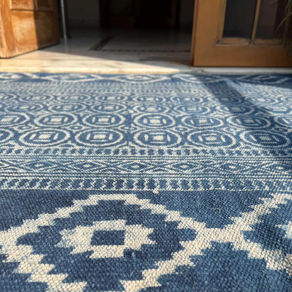 Handcrafted Indian cotton rugs with timeless design. Shop boho area rugs for living room, bedroom & home décor.
