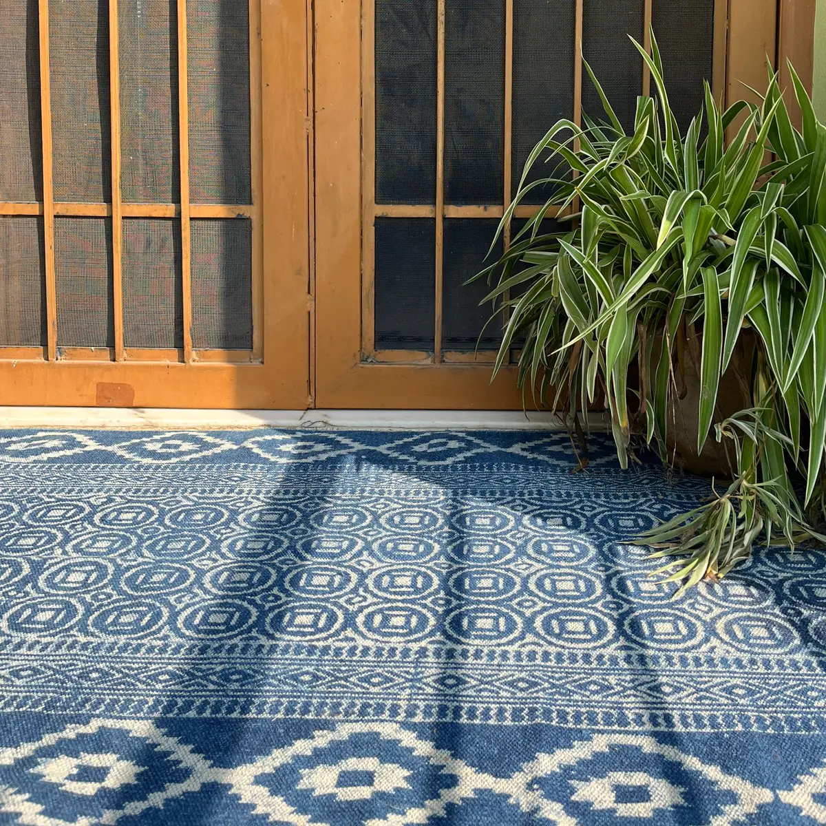 Handcrafted Indian cotton rugs with timeless design. Shop boho area rugs for living room, bedroom & home décor.