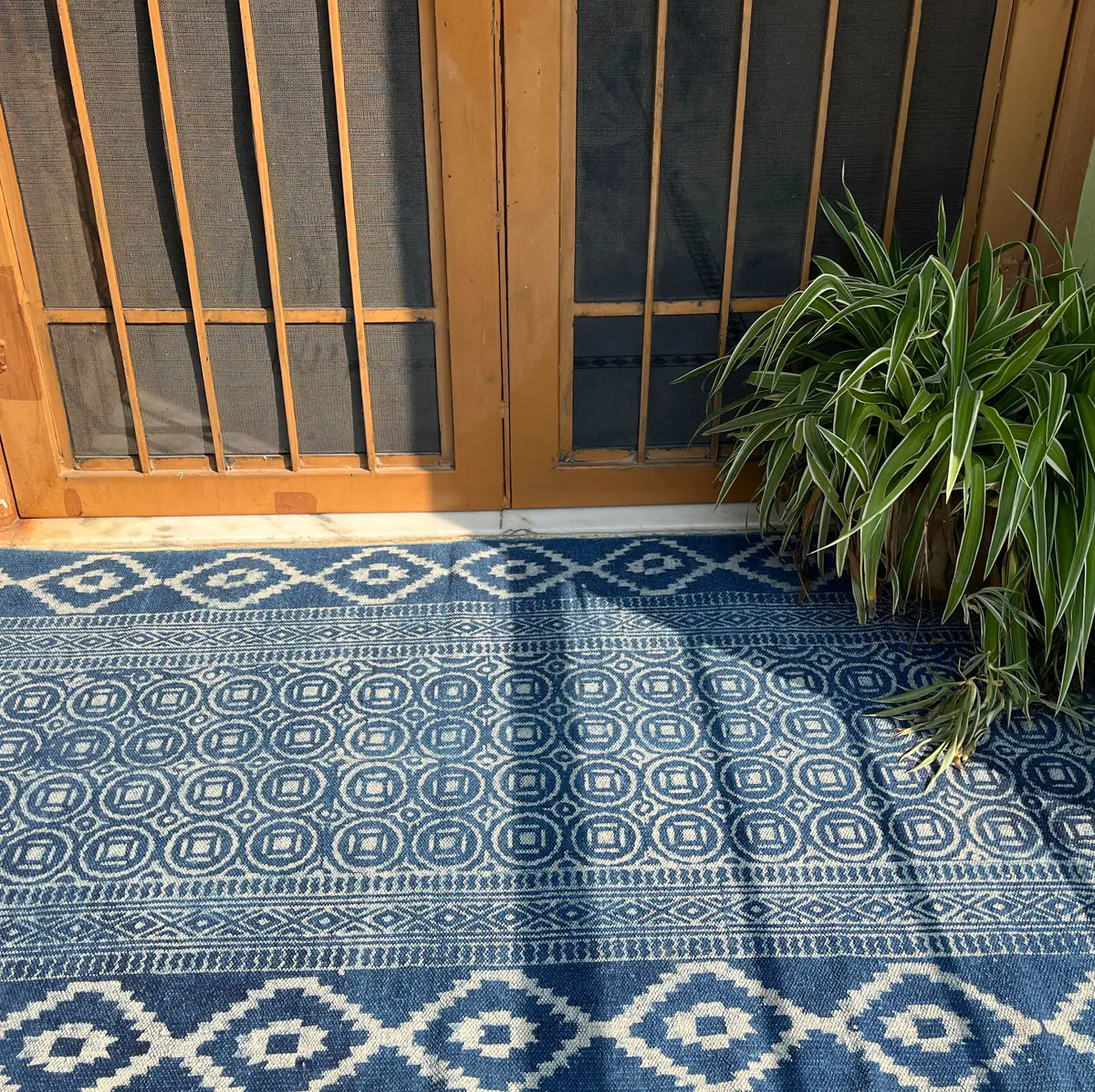 Handcrafted Indian cotton rugs with timeless design. Shop boho area rugs for living room, bedroom & home décor.