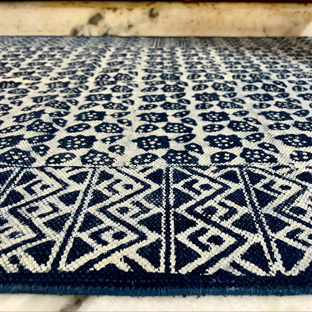 Shop handmade Indian cotton rugs crafted by skilled artisans. Boho, modern & durable area rugs for living rooms and bedrooms.