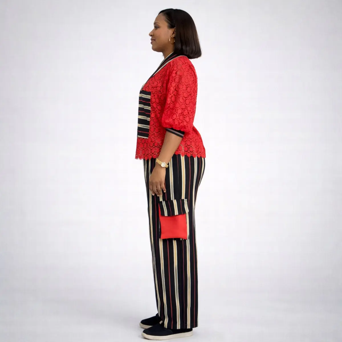 Side view of red and black striped Aso Oke women’s two-piece set with lace top and wide-leg pants.