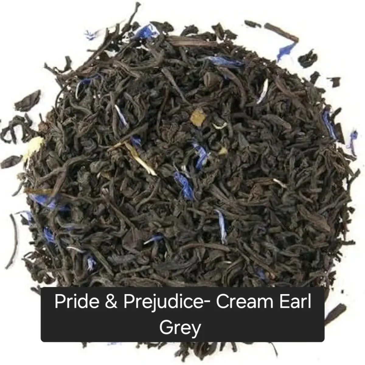 A close-up mound of loose leaf black tea blend featuring dark twisted tea leaves scattered with vivid blue cornflower petals and light cream-colored botanical pieces. The blend is rich, textured, and aromatic in appearance, showcasing the artisan small-batch craftsmanship of this Cream Earl Grey. Color: Black with Blue Cornflower Petals